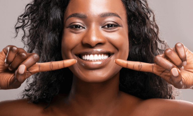 Woman pointing at Invisalign in York